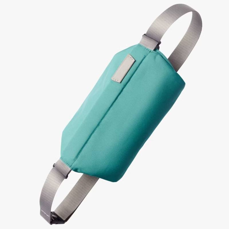 Multi-Wear Teal Mini Sling Bag Featuring Leather Trim, Magnetic Buckle & Adjustable Wide Strap for All-Day Daily Outfits