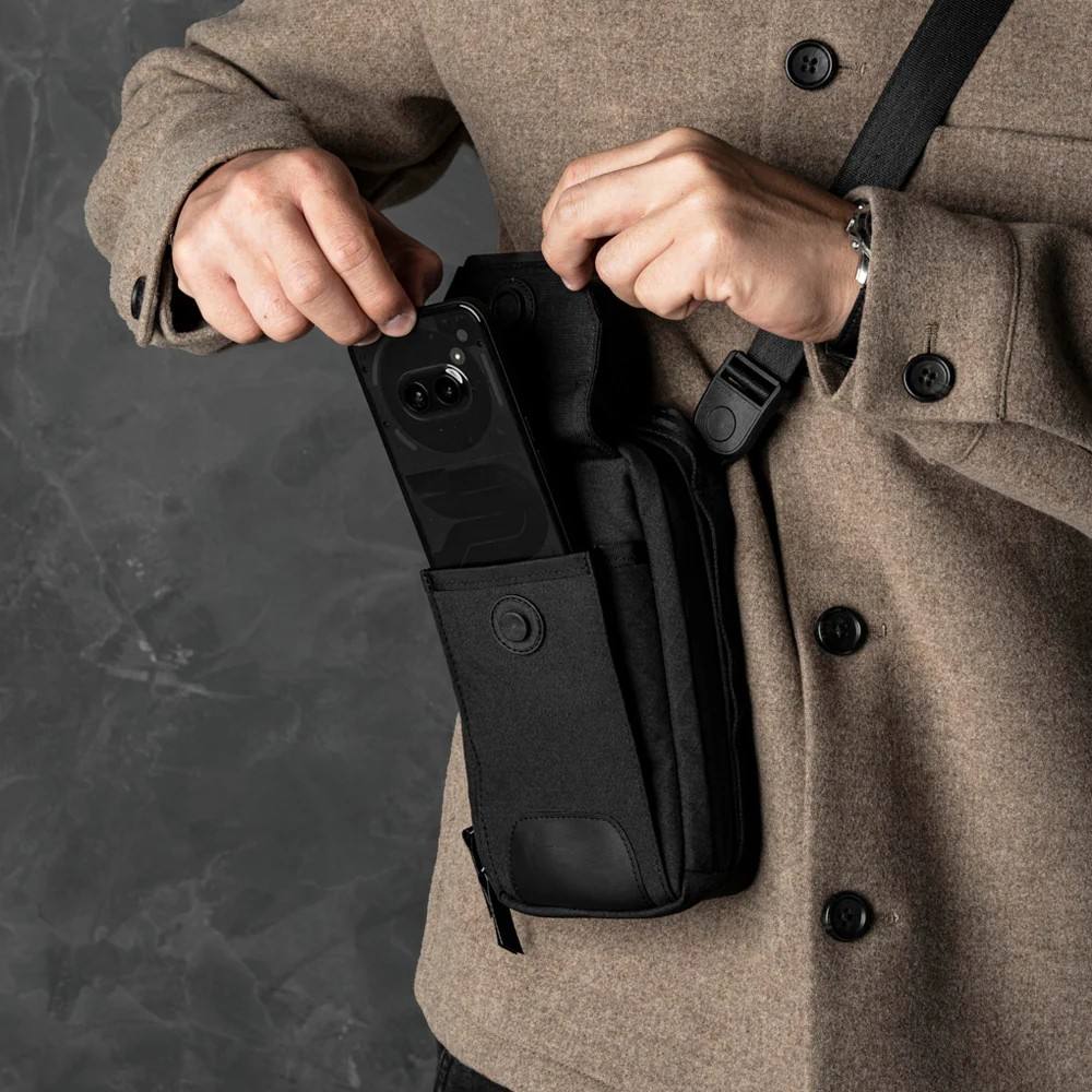 Compact Black Mini Phone Chest Bag with Leather Accent Adjustable Strap