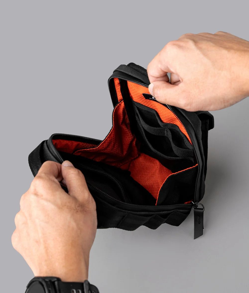 Compact Black Mini Phone Chest Bag with Leather Accent Adjustable Strap